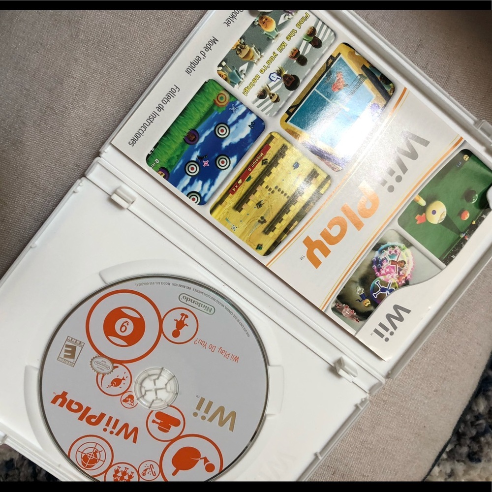 Wii by Nintendo- we. Wii play games